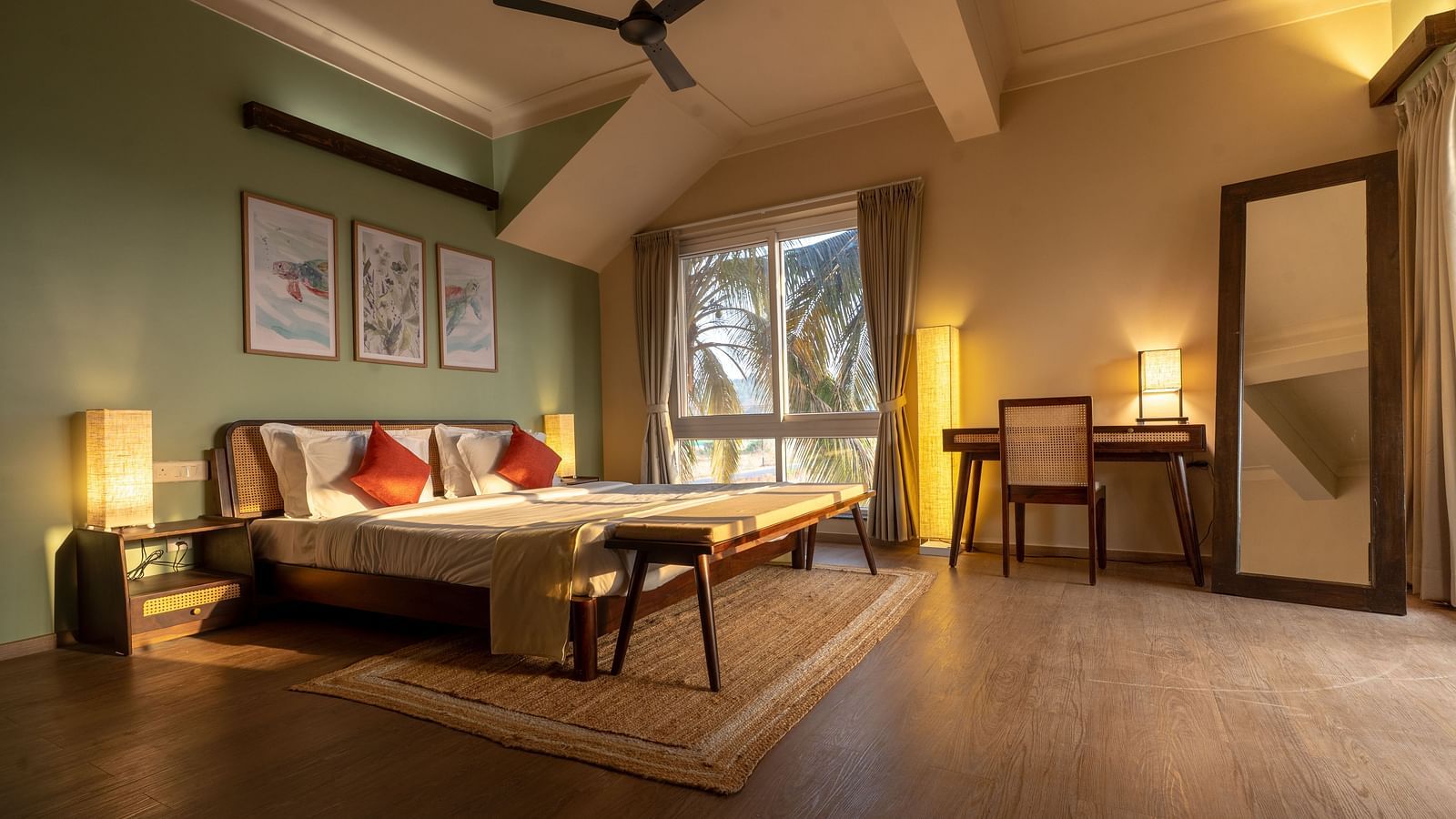 Spacious bedroom with cosy lighting, artwork, and natural wooden elements at Kssemya.