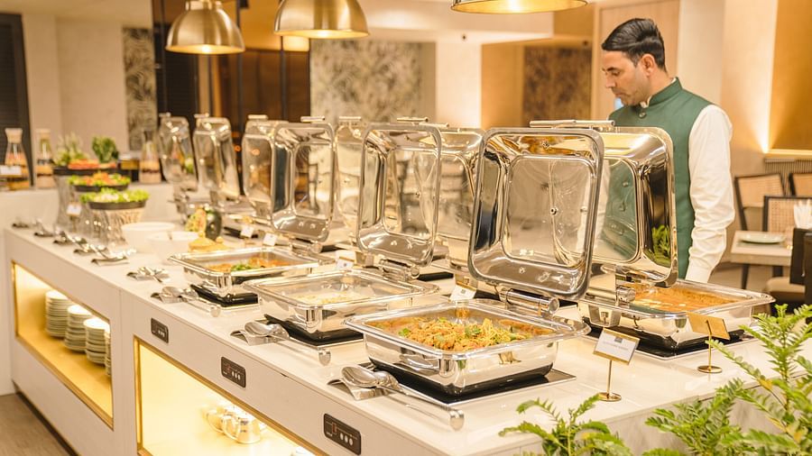 view of a buffet station at Mishri, the restaurant at Triptam Hotel, Vrindavan