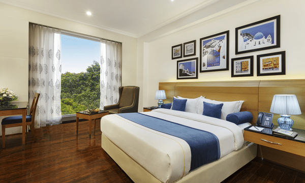 Executive Room at La Marvella, Bengaluru with king size bed and modern amenities