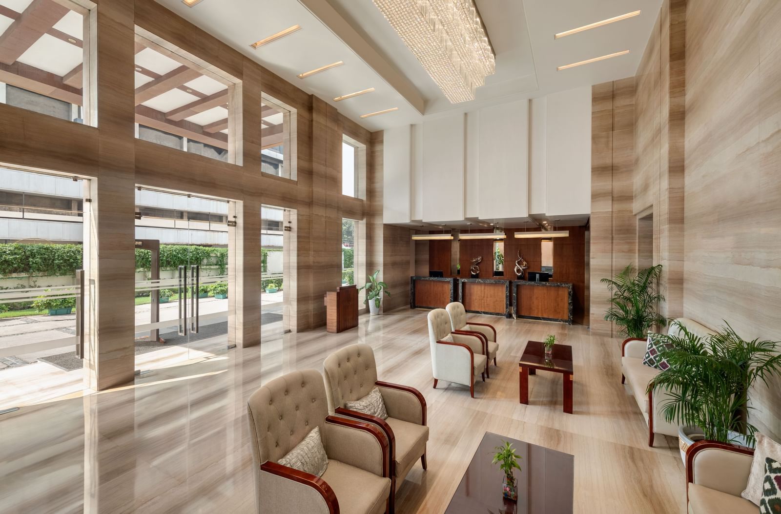 Hotel lobby lounge area with comfortable seating and contemporary decor at Ramada by Wyndham Ghaziabad Vasundhara