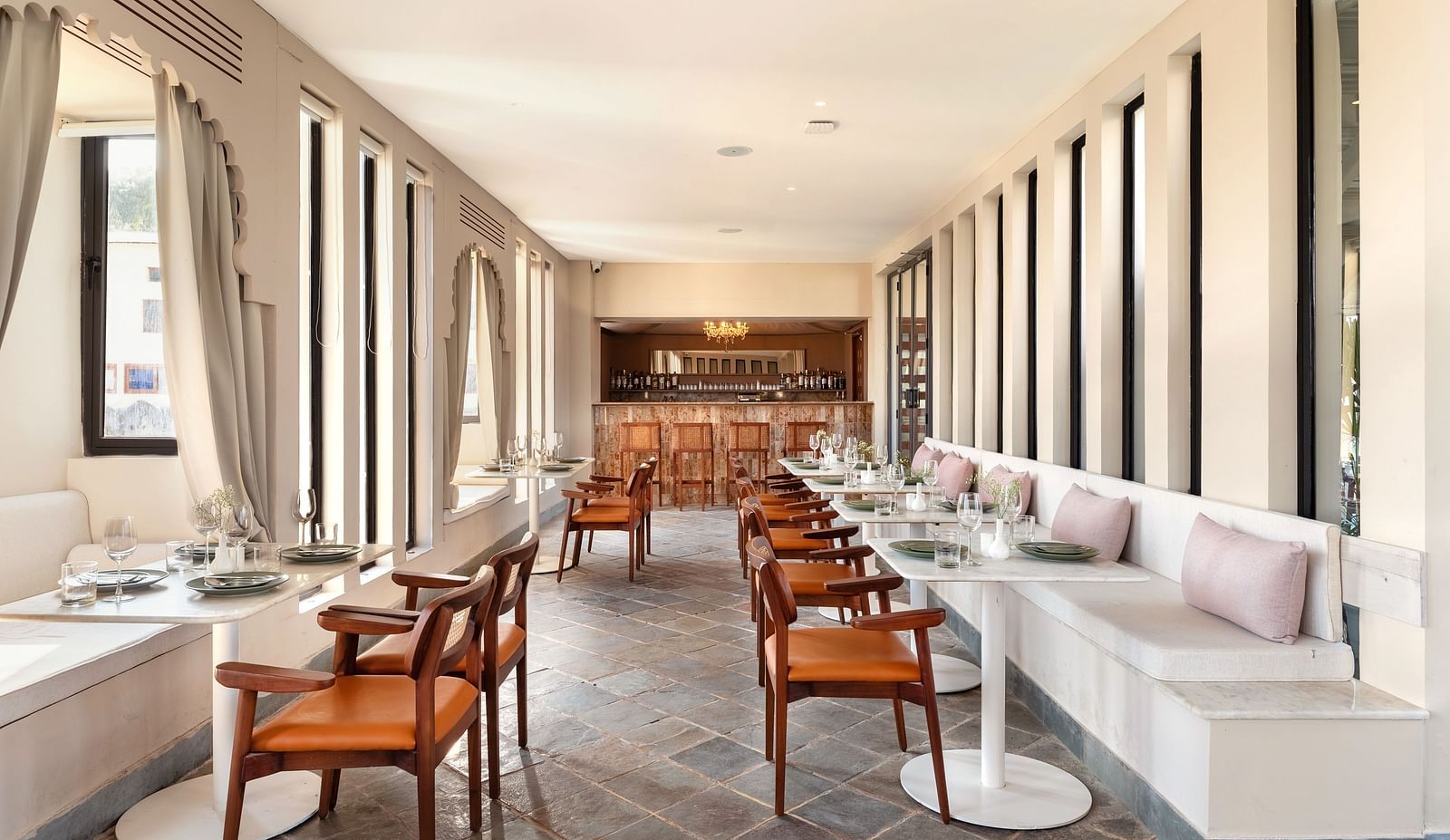 Seating arrangements inside a restaurant at Manuscript - Jhilwara Haveli, Udaipur