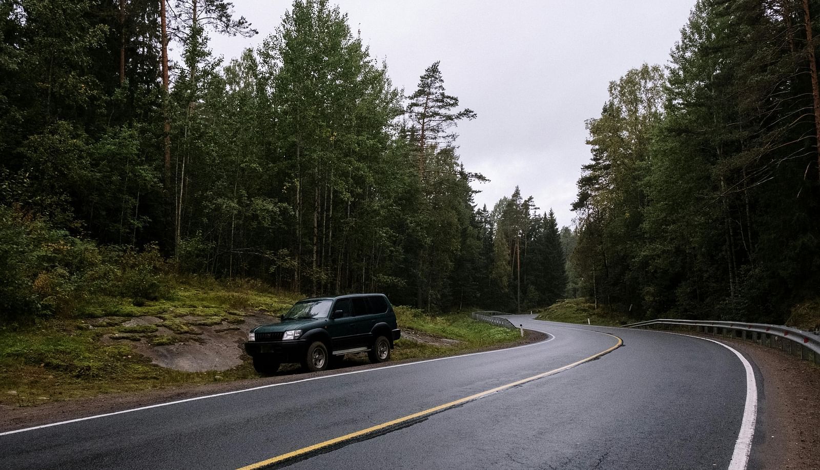 An image of a car parked at the side of the road | Ocean Sprays
