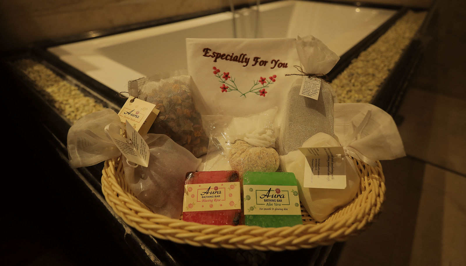 An image of a basket which has all the spa products and items - Sathyam Grand Resort