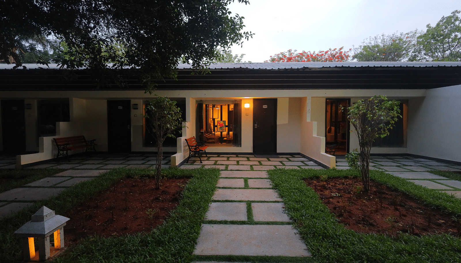 An image of property amidst trees and plants - Sathyam Grand Resort