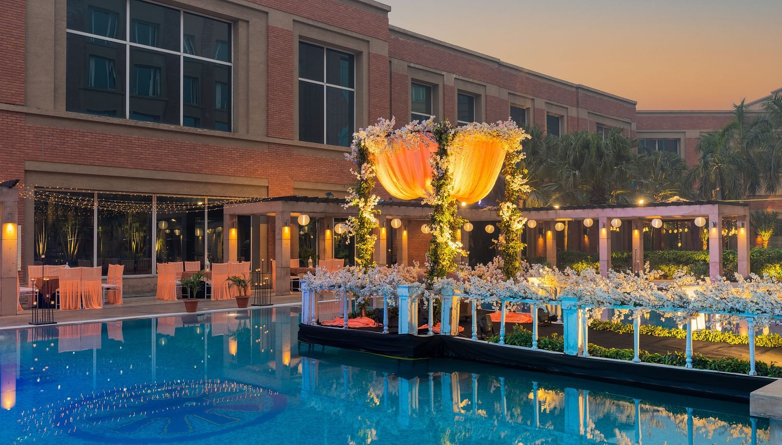 Lavish outdoor decoration of a pool at Nirvana Luxury Hotel, Ludhiana