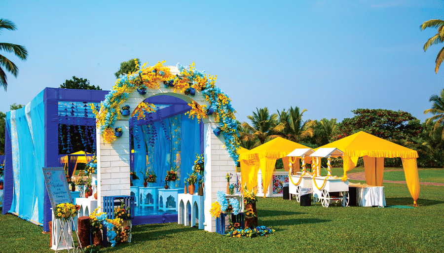 decorated places on the lawn with tents and arch entrance - Caravela Beach Resort Goa