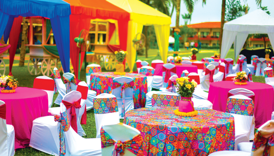 seating arrangements with tents in the background - Caravela Beach Resort Goa
