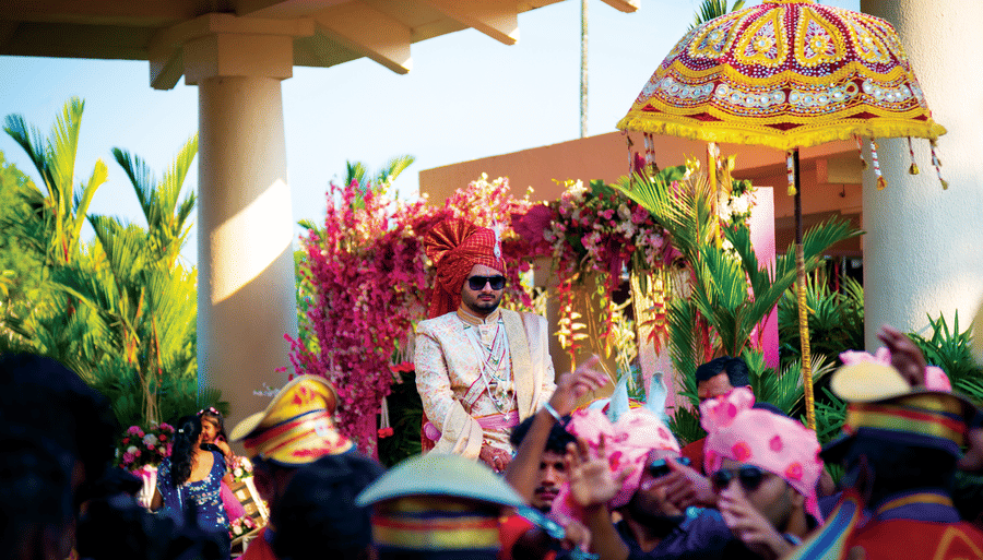 the groom in view during the baraat - Caravela Beach Resort Goa