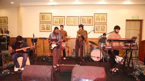 An image of a band playing music at an event at Heritage Village Resorts & Spa
