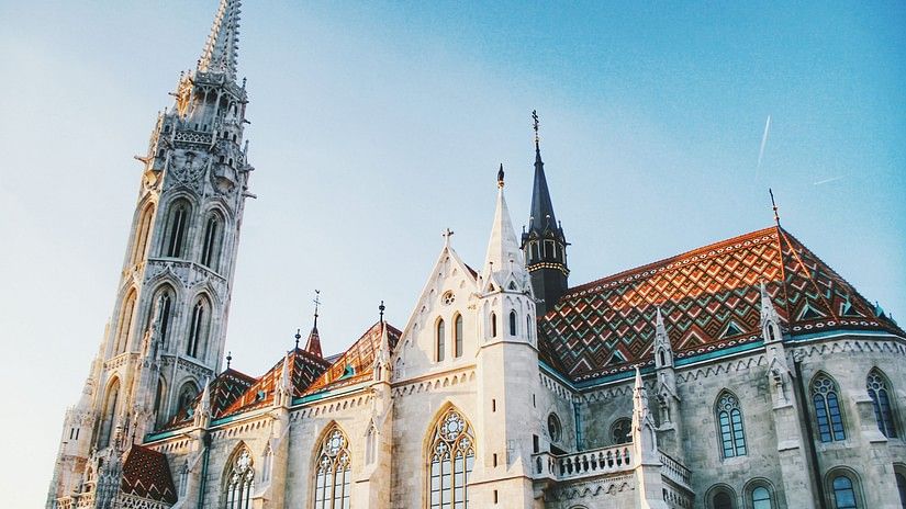 Exterior of a church with blue sky in the background