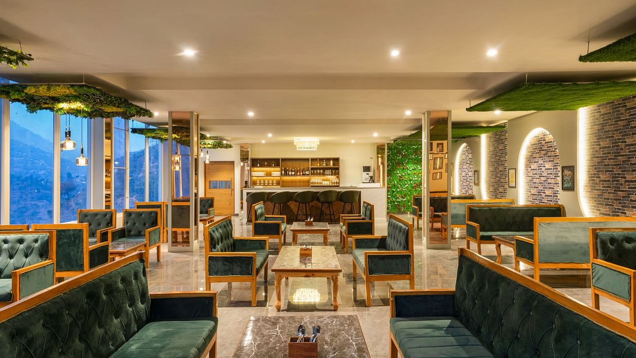 A hotel lounge features comfortable seating and a stylish design - SPT Clarks Inn Suites, Mandi