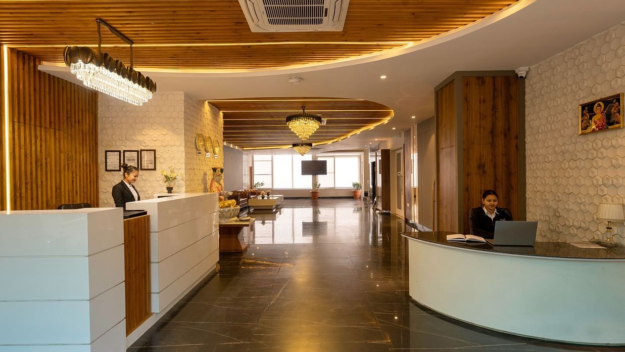 The lobby area showcases a modern design with unique lighting.