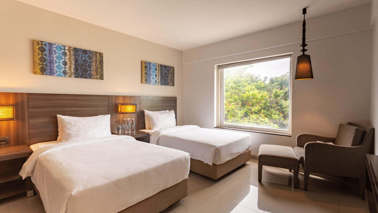 Twin Room with two bed overlooking the pool at The Residency Towers Rameswaram