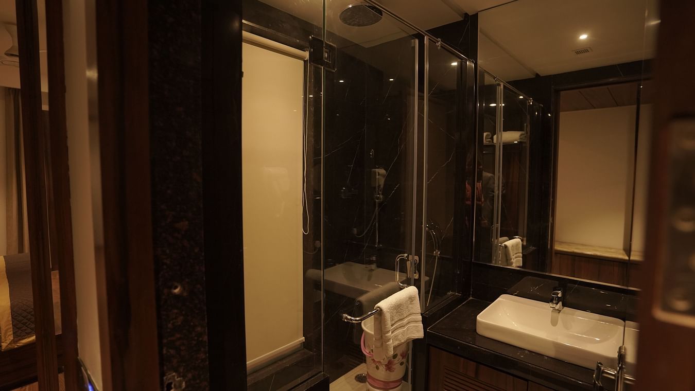 Executive room bathroom with modern amenities at Classic Sapphire by Ananta