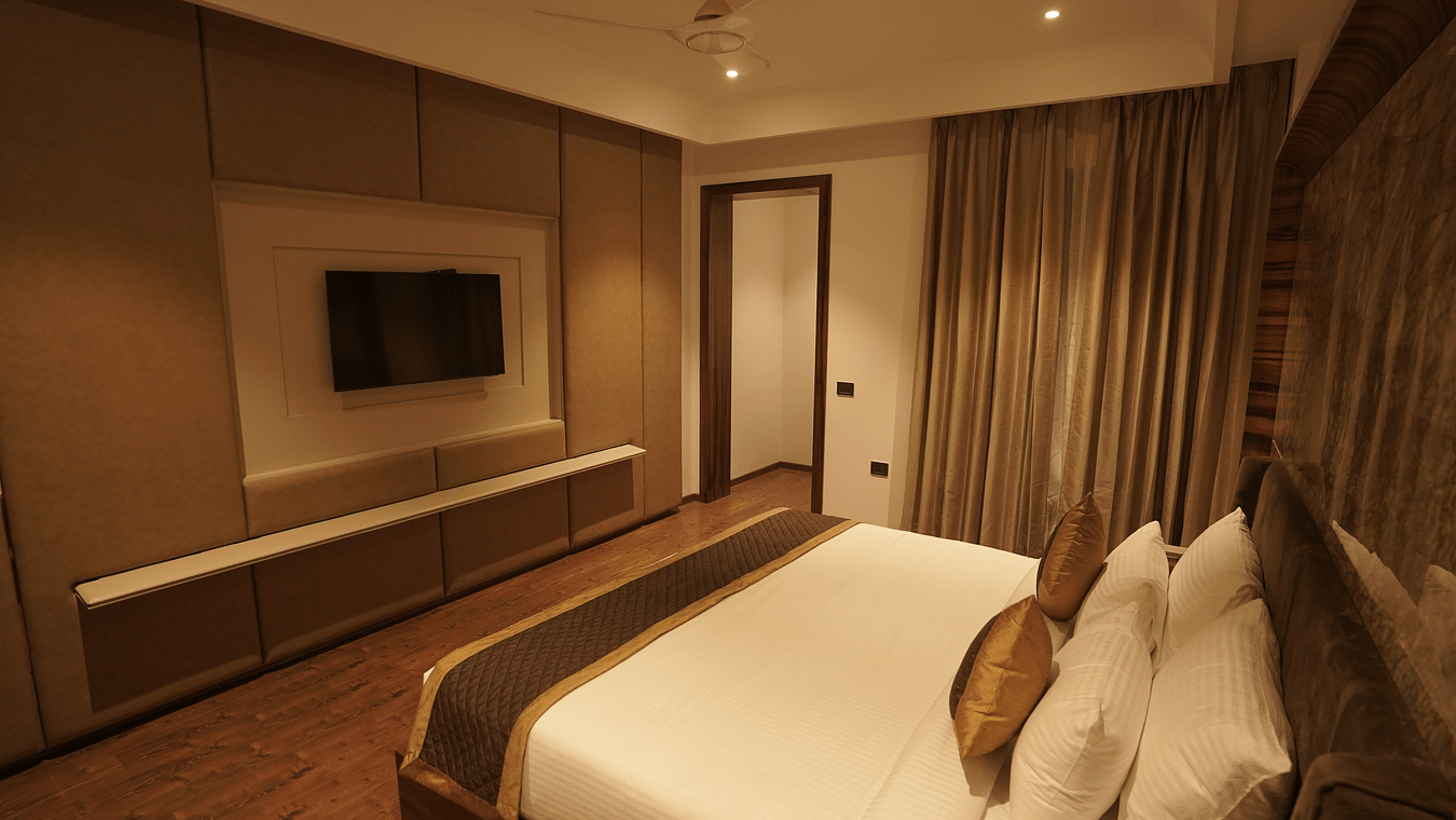Superior room with king size bed and LED TV at Classic Sapphire by Ananta