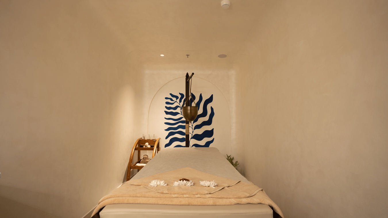 A well-made bed with attention to detail, emphasising comfort and luxury - Karma Lakelands.