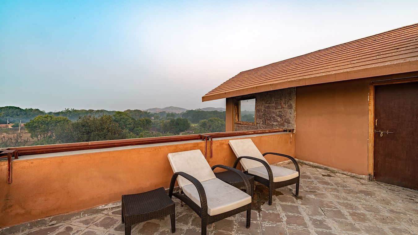 two seats kept on a terrace of one of the rooms in Ranthambore