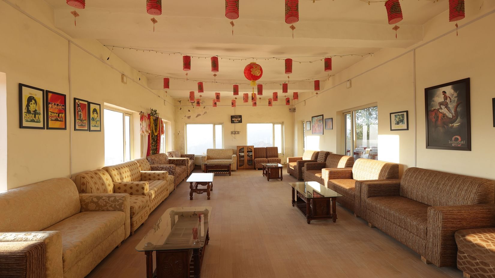 a well-decorated lounge area with sofas and coffee tables