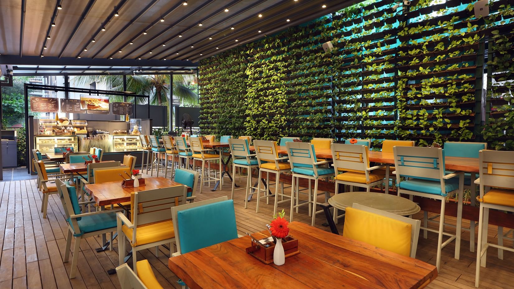 The Empresa Boutique Hotel - the colourful seats offered at Loca Loca Bistro in Andheri 1