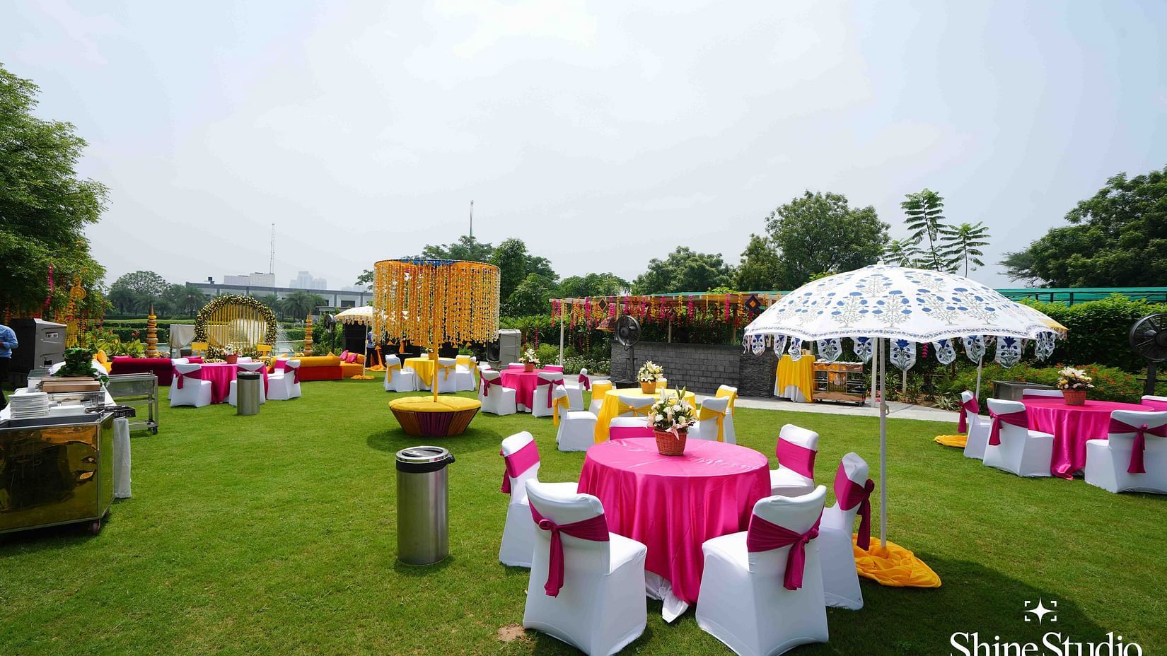 round table seating in the lawn at Karma Lakelands.