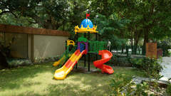 a slide in the kids play area at ABN Sarovar Portico, Jim Corbett