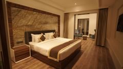 superior room with king size bed at Classic Sapphire by Ananta