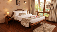 view of a bedroom and a window beside it - Hotel Polo Towers, Shillong