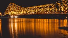 view of a well-lit howrah bridge during nighttime