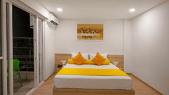 Front view of the Studio Premium Room with a cosy bed at Nest by Rivido Apart Hotel, Bannerghatta Road
