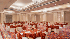 tables and chairs set up in a cluster arrangement in our event venue in jalandhar - Park Plaza, Jalandhar
