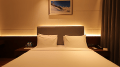 view of king size bed of Premium Room at Pride Elite, Haridwar
