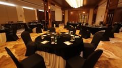 view of the banquet hall with chairs and tables at Pride Elite, Haridwar