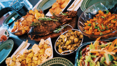 roast meat and side dishes kept in bowls served on a table
