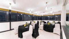 Elegant banquet hall set up for meetings and events with formal seating arrangement at Rivido - Manyata