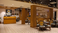 interior and seating arrangements inside The Sunset bar & Restaurant at Rosetum Kasauli