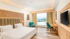 Work desk and refreshment counter in the Superior Room at Sarovar Portico, Ajmer