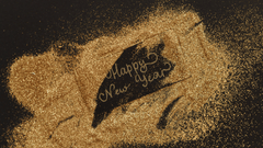 'Happy New Year' written in gold glitter on a dark background.