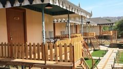 the outside patio of one of the cottages in Ranthambore at The Baagh Ananta Elite