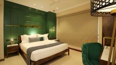 rooms with a king bed and modern interiors at theory9 bandra