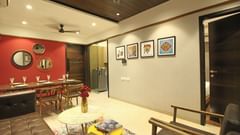 living room with dining area at theory9 khar