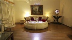 a round bed inside Honeymoon Suite - White pearl suites by rosetum 