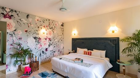 a double bed in one of the rooms in Villa 21 - 2