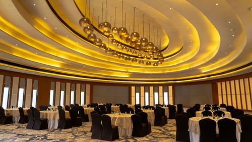Banquet hall with cluster seating arrangement at Ananta Spa and Resort, Ajabgarh
