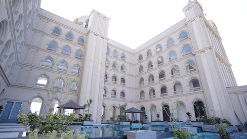 Facade of Classic Sapphire by Ananta with swimming pool 2