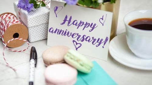 An anniversary card next macrons and a cup of coffee - Heritage Village Resort & Spa, Goa