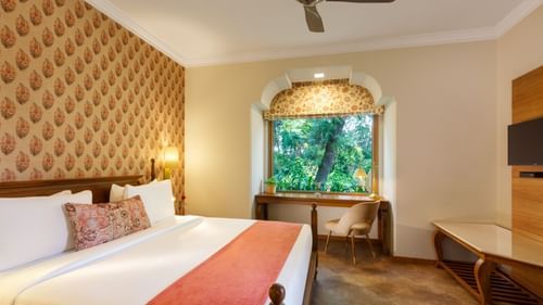 bedroom of the Aangan Suites at Heritage Village Resorts and Spa