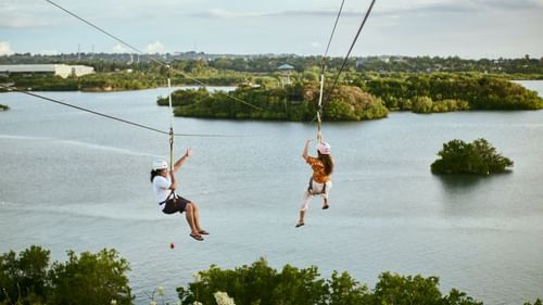 Ziplining with waters below