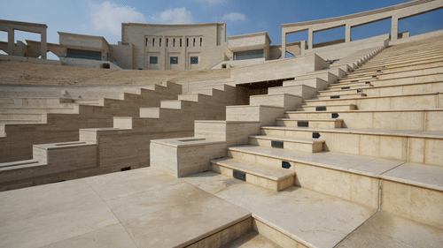 Large outdoor amphitheatre made of light-coloured stone, featuring stepped seating rows and arched buildings in the background.