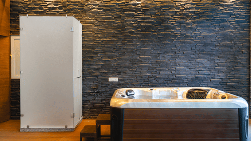 A jacuzzi placed in a room next to a wardrobe at Montclair Ananta, Elite.