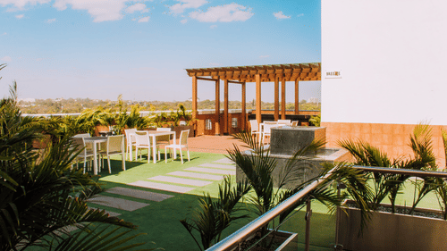 A serene outdoor view of Breeze restaurant at Neelkanth Sarovar Premiere Lusaka